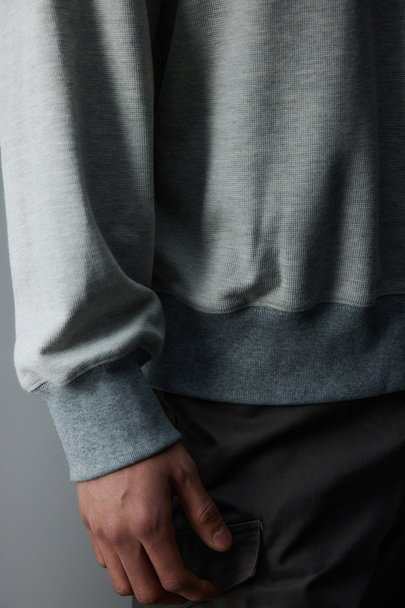 WHISTLEHUNTER Asymmetrical Zipper Rivet Mock Neck Light Sweatshirt