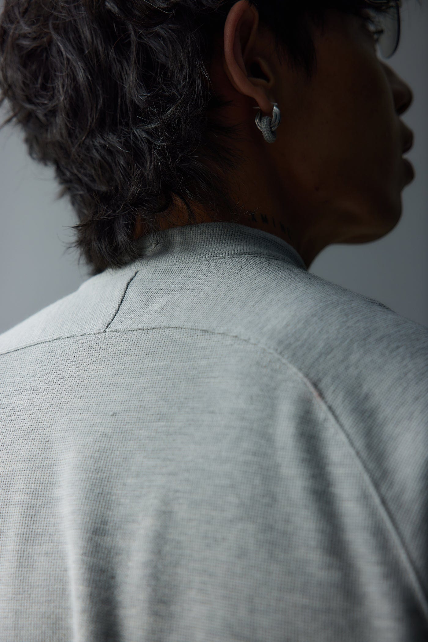 WHISTLEHUNTER Asymmetrical Zipper Rivet Mock Neck Light Sweatshirt