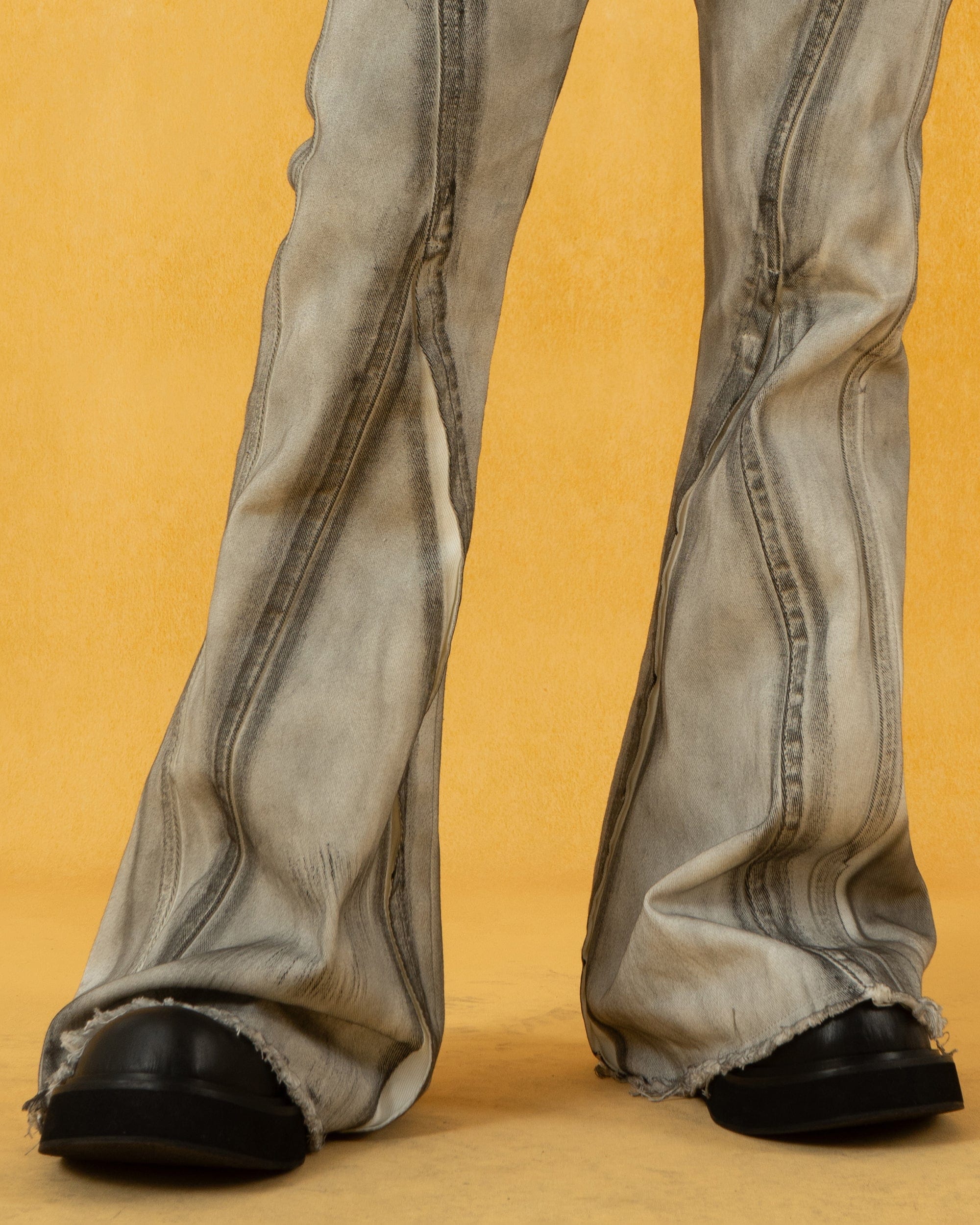 CLP Spliced Distressed Raw Edge Flared Jeans