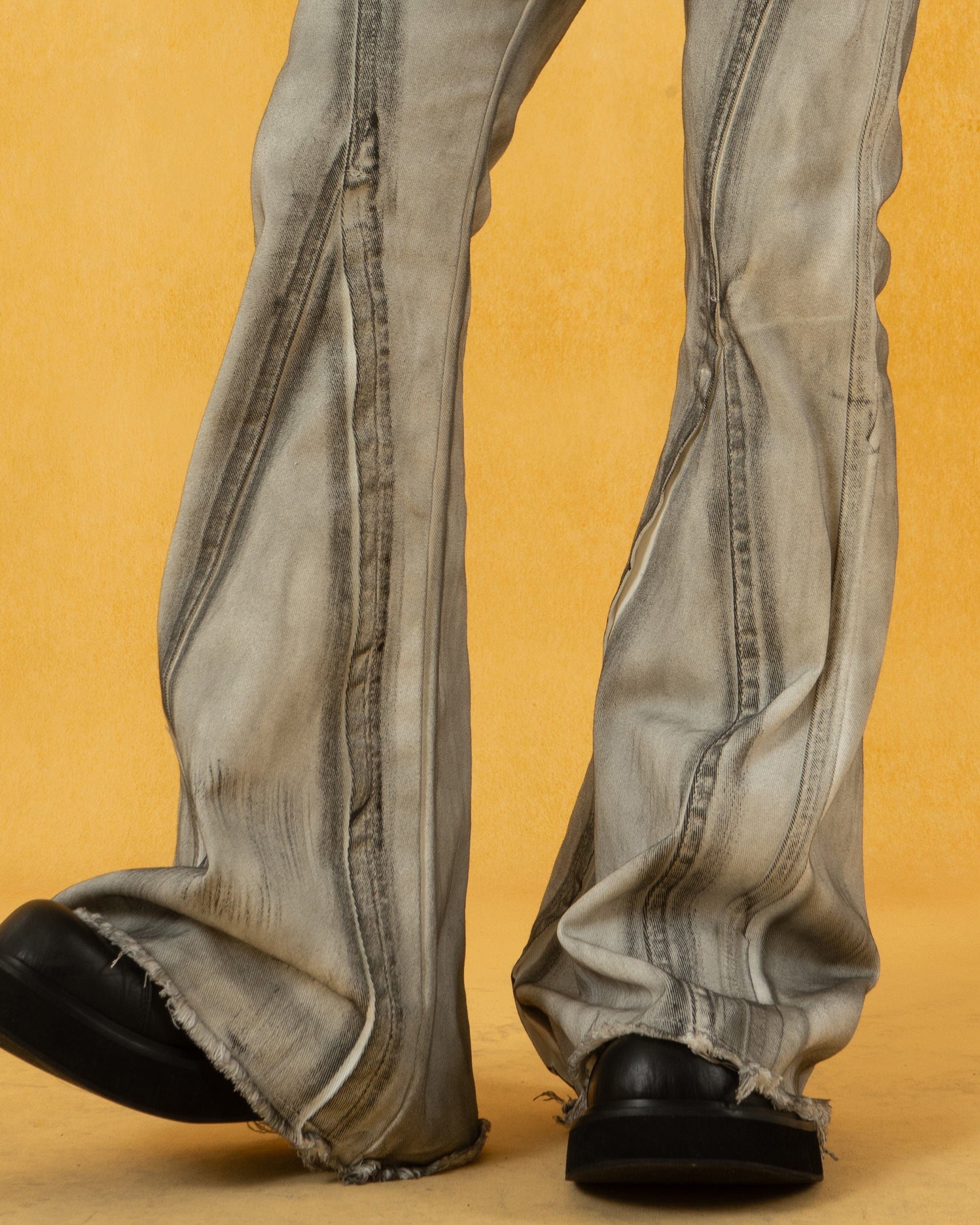 CLP Spliced Distressed Raw Edge Flared Jeans