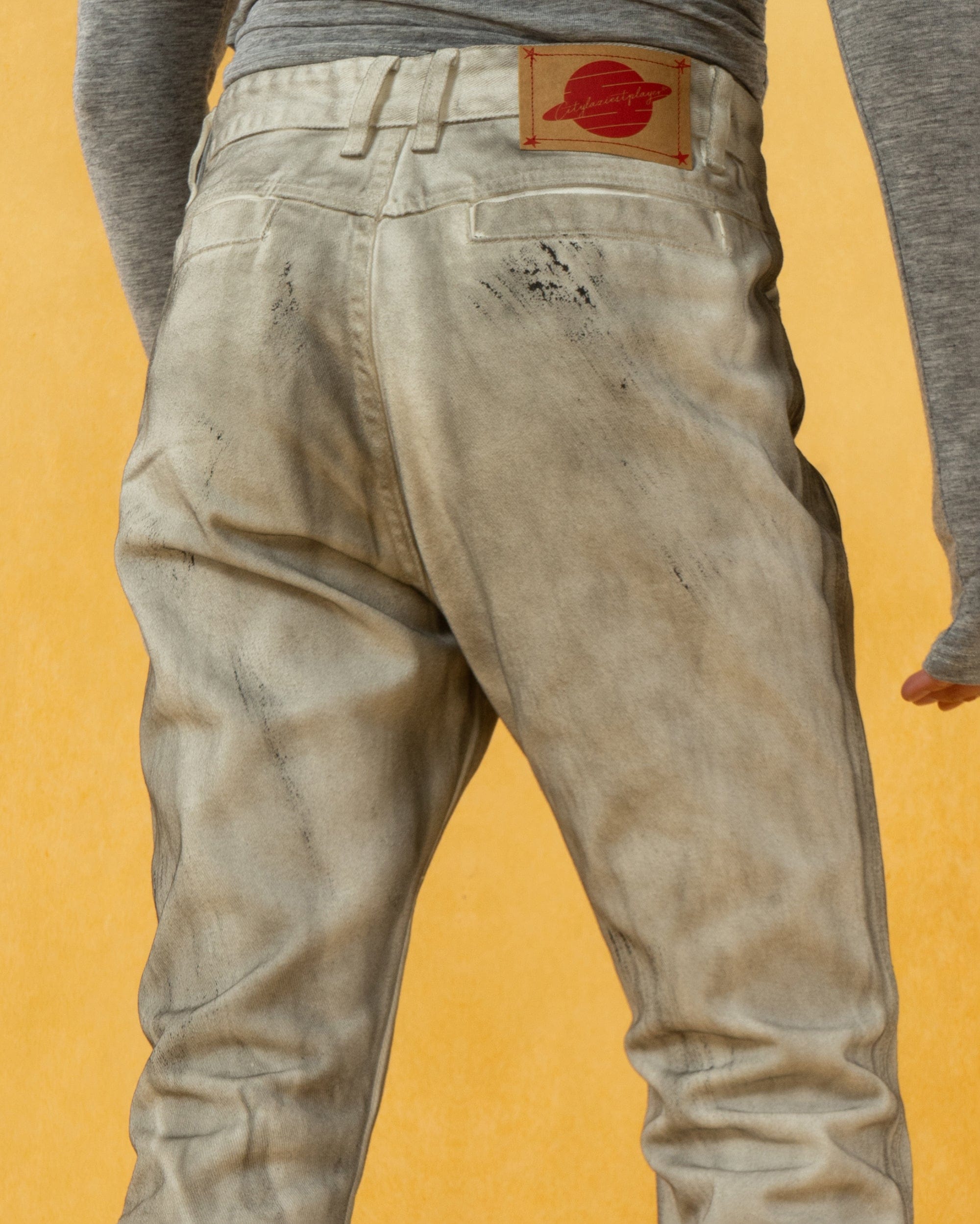 CLP Spliced Distressed Raw Edge Flared Jeans