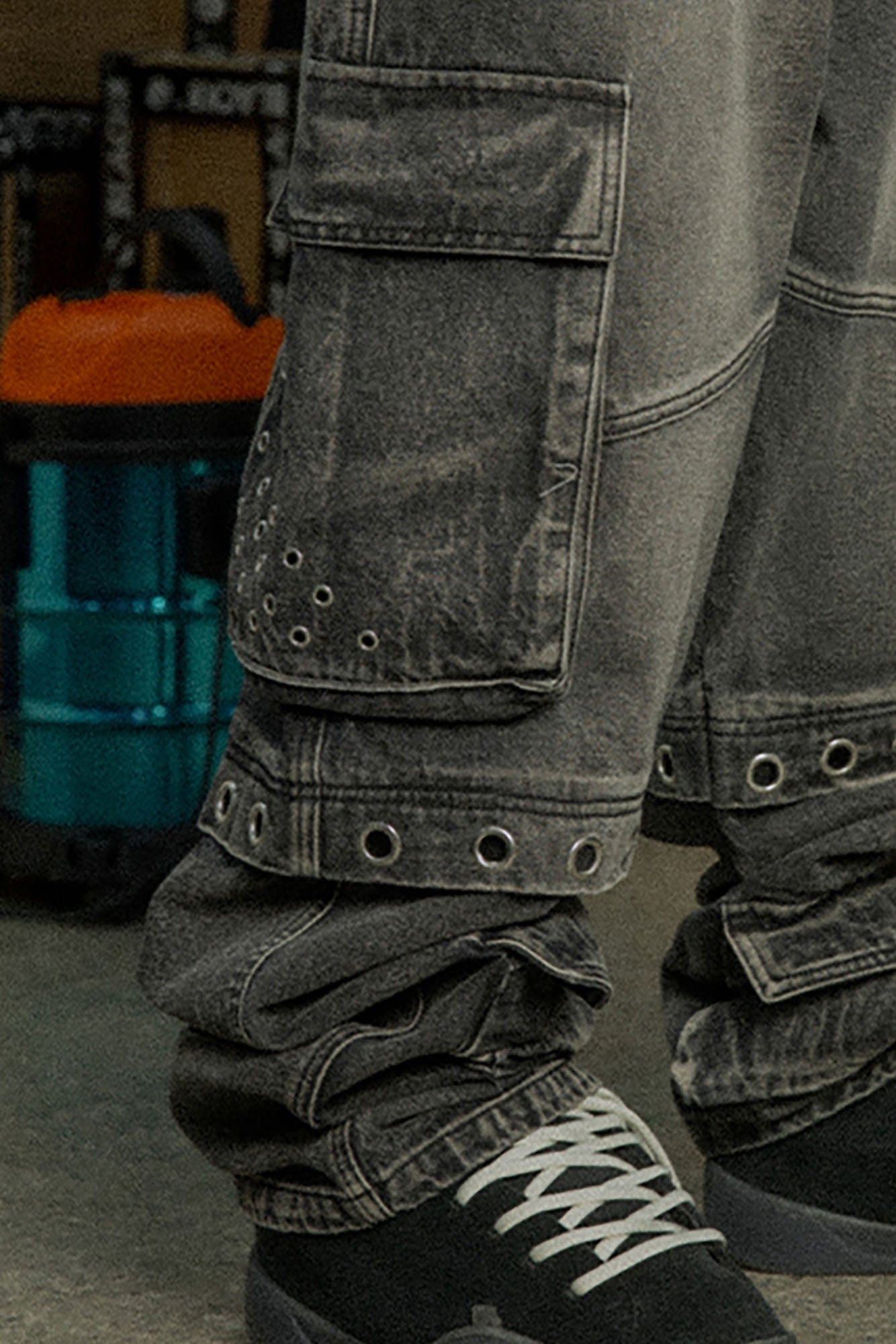 BLACK8MOB Washed Multi-Pocket Grommet Stacked Cargo Jeans