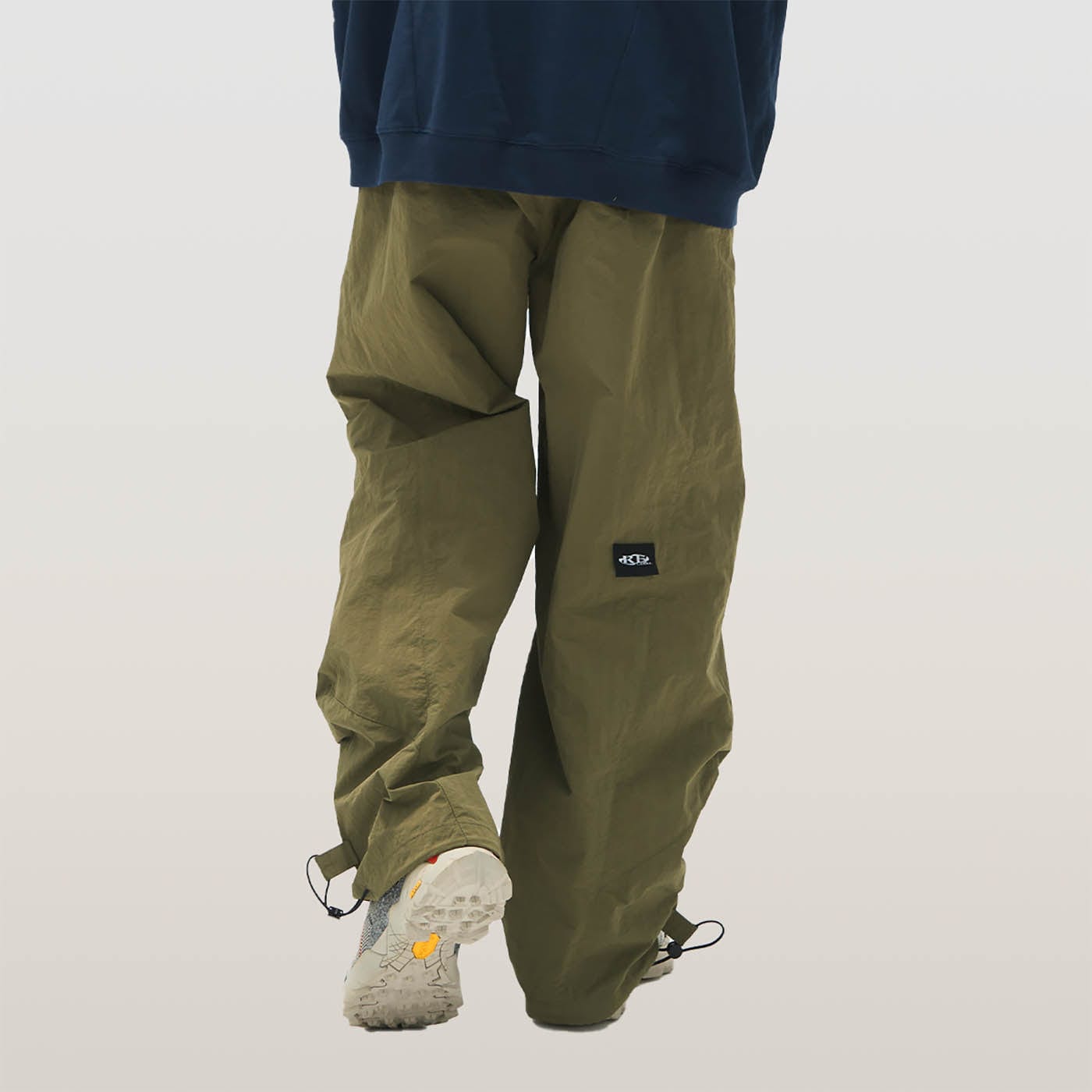 RELABEL Pleated Spliced Parachute Pants