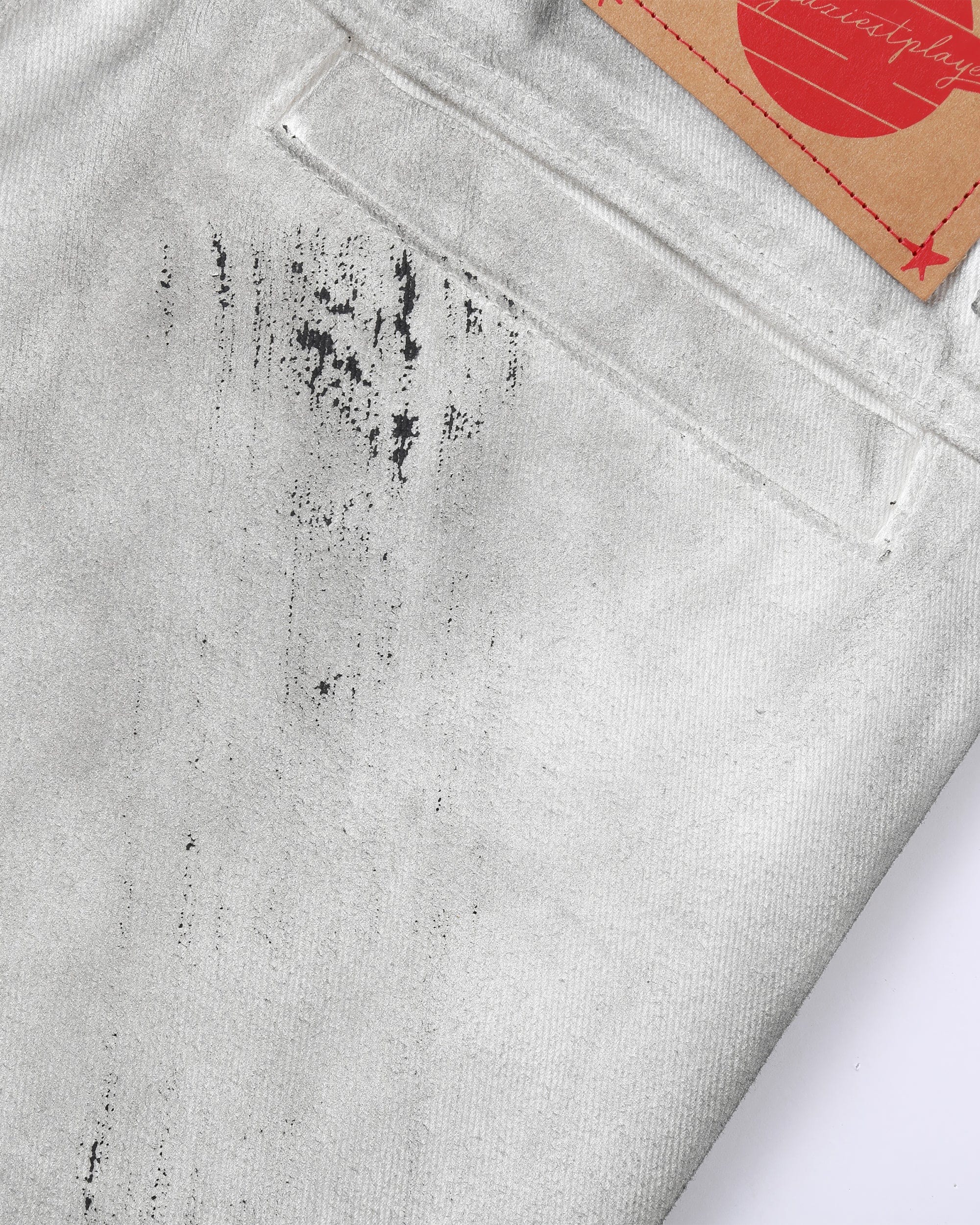 CLP Spliced Distressed Raw Edge Flared Jeans