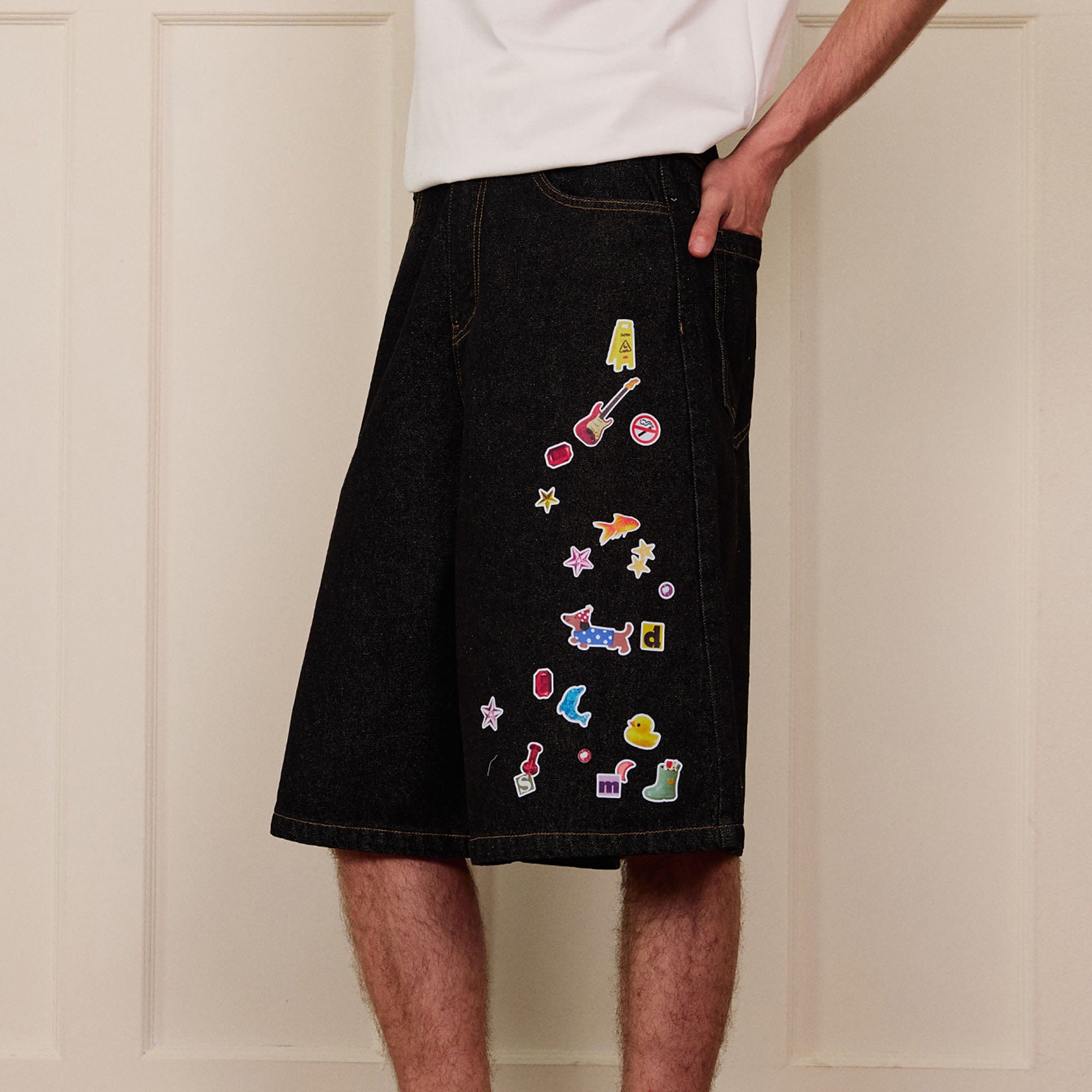 DONSMOKE Whimsical Stickers Washed Raw-Edge Shorts