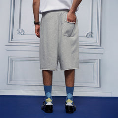 UNLIMITED MOTE Multi-Pleated Drawstring Raw-Hem Shorts