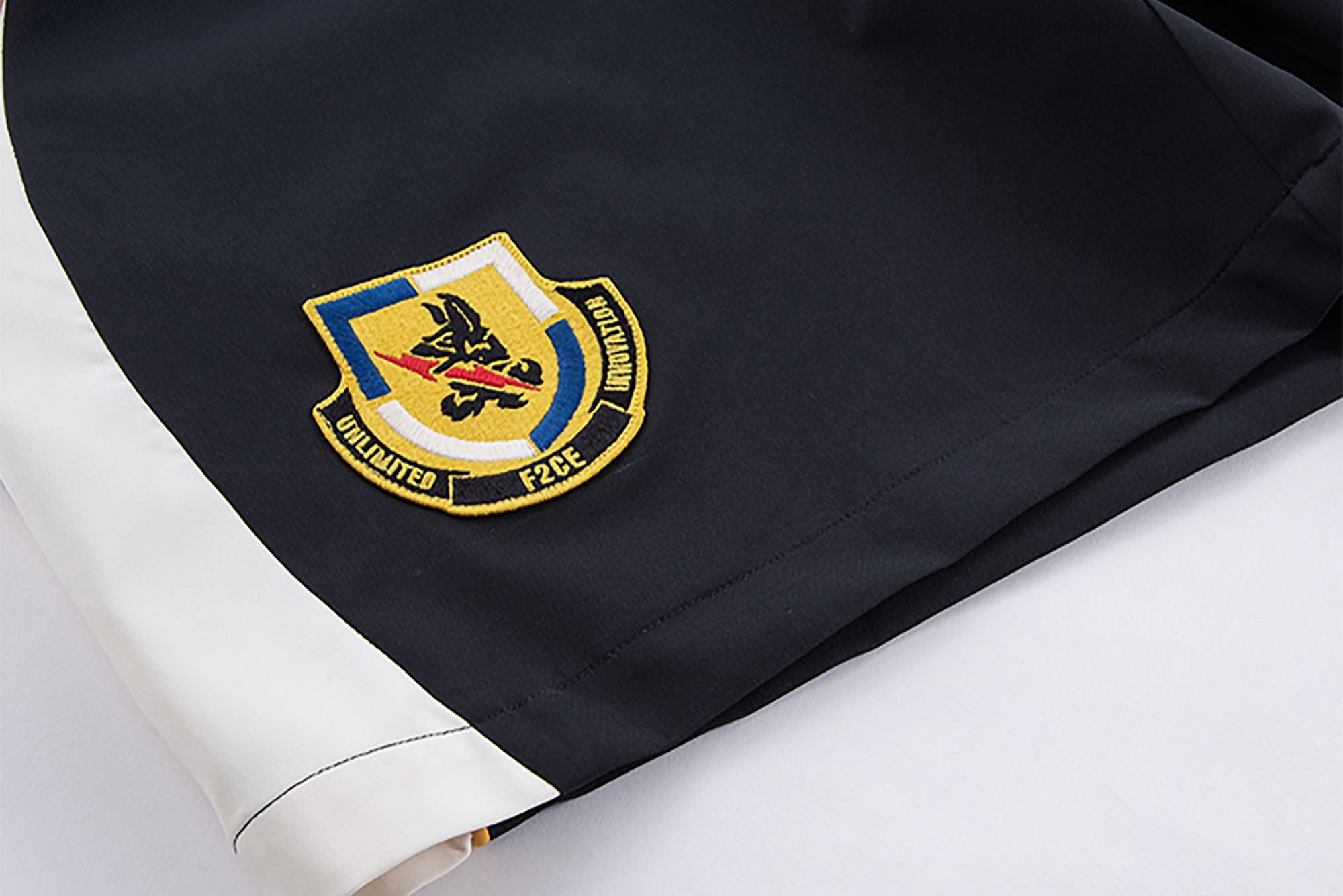 F2CE Curved Panel Embroidered Badge Shorts