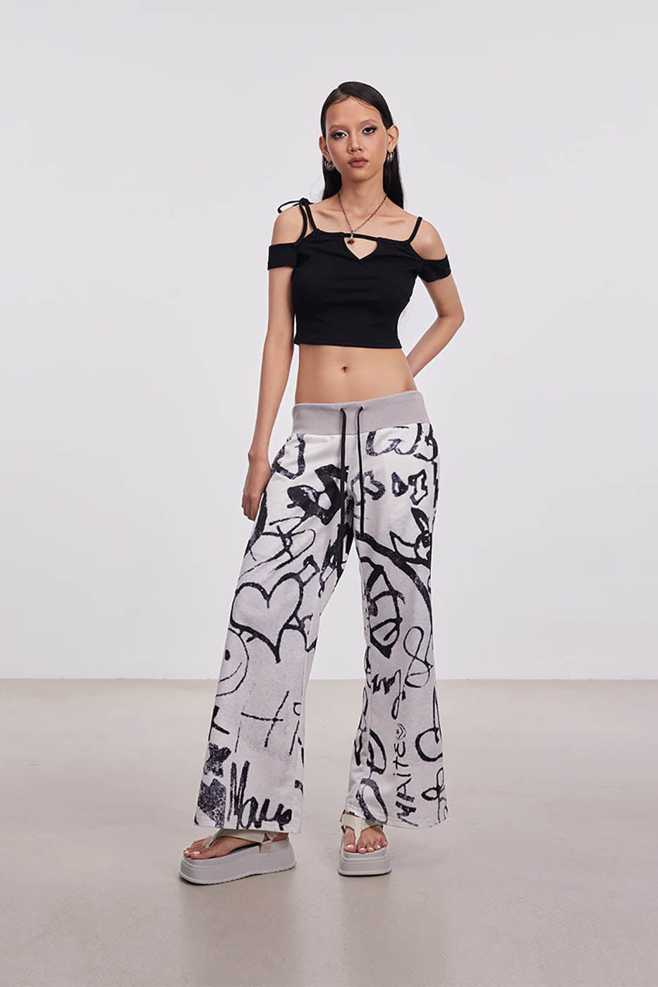 DAMAGE ASIA Doodle Full-Print Wide-Leg Pants