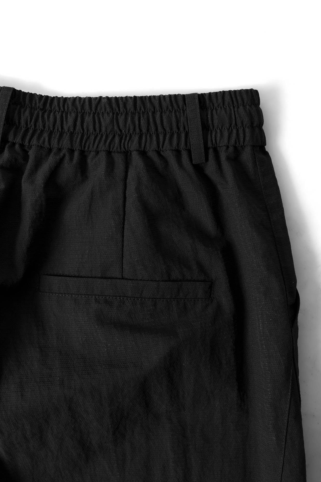 RELABEL Deconstructed Paneled Drawstring Parachute Pants
