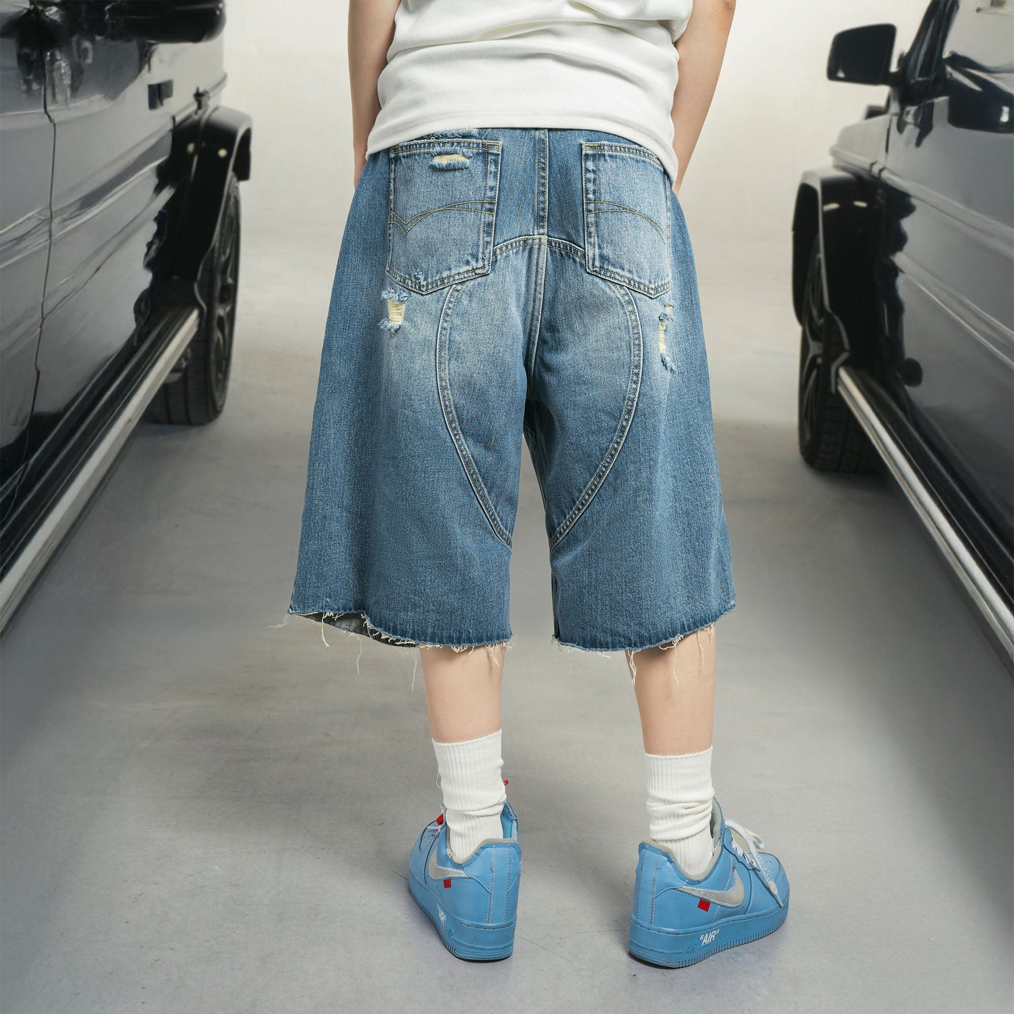 MAKEMORE Distressed Arc Spliced Ripped Denim Shorts