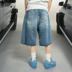 MAKEMORE Distressed Arc Spliced Ripped Denim Shorts