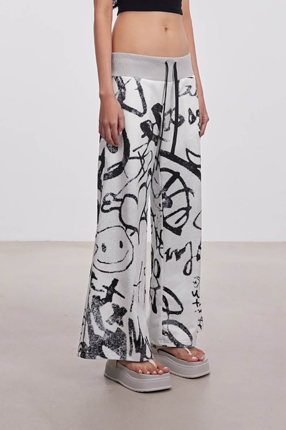 DAMAGE ASIA Doodle Full-Print Wide-Leg Pants