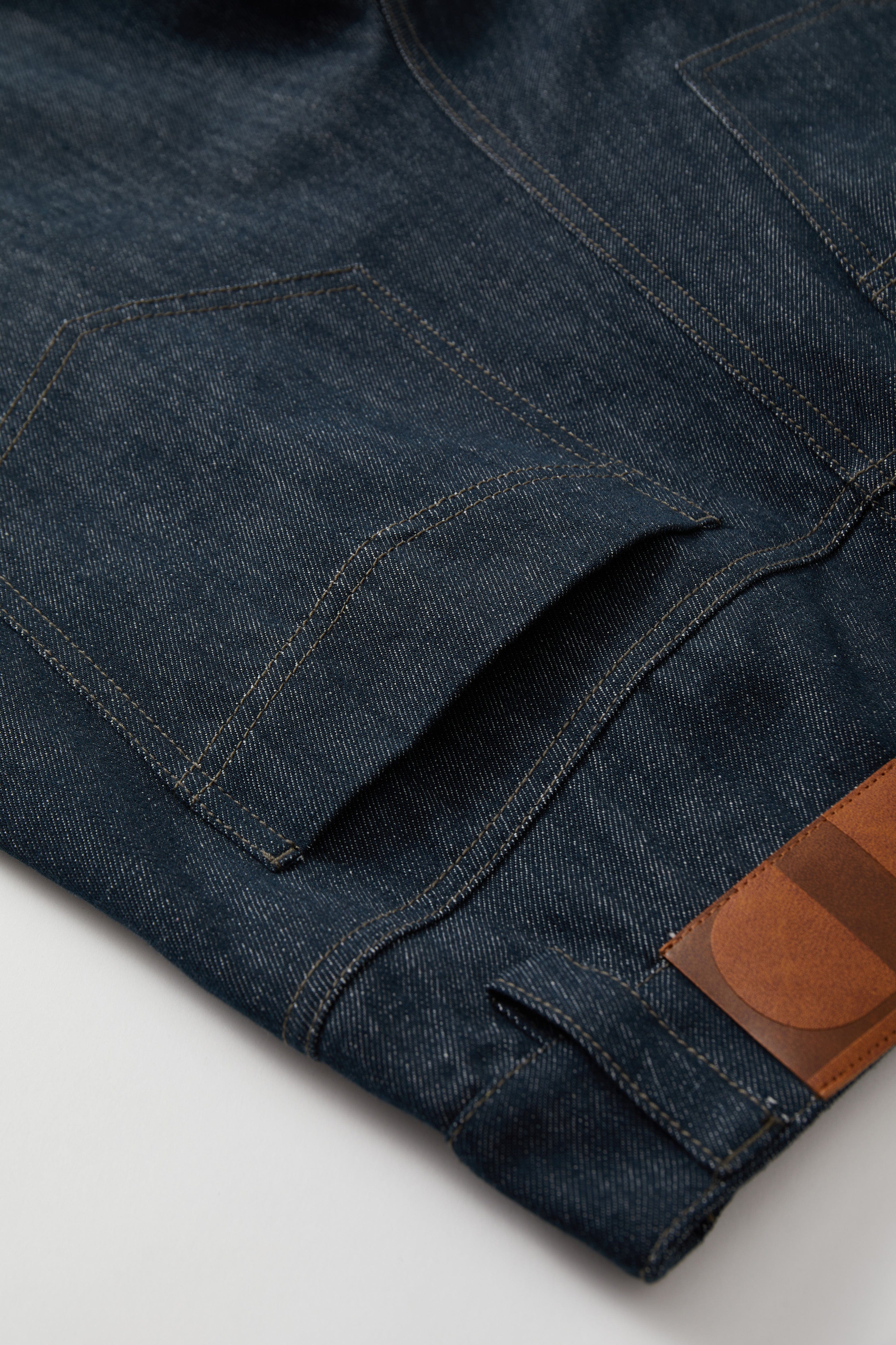 OPICLOTH Washed Asymmetric Fly Pleated Denim Shorts