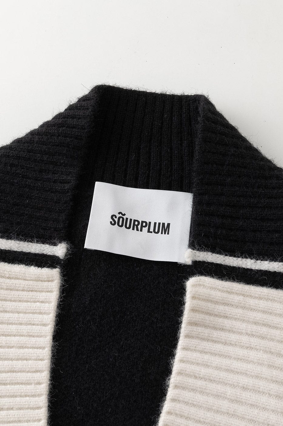 SOURPLUM Modern Spliced V-Neck Sweater