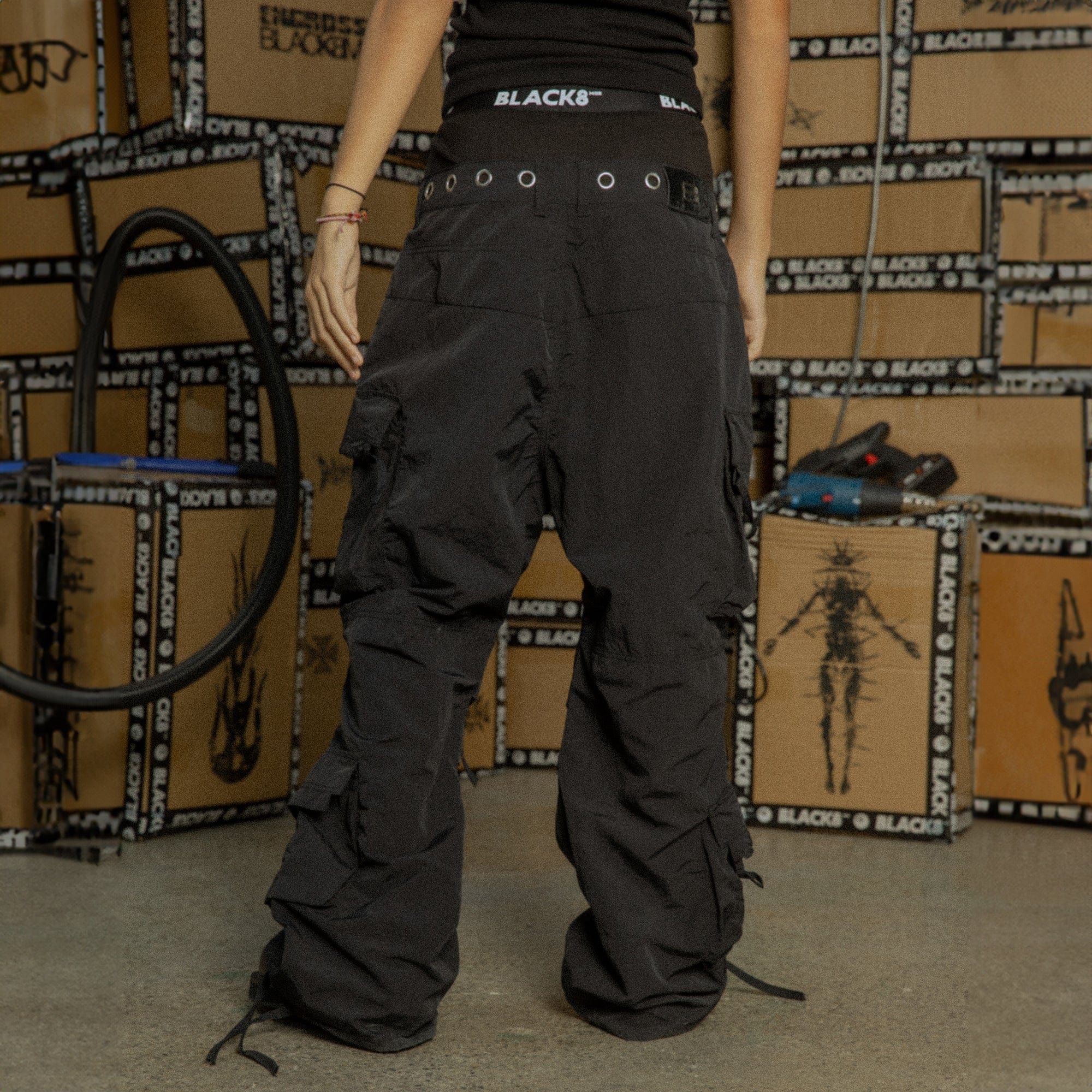 BLACK8MOB Eyelet Waist Tie Multi-Pocket Parachute Pants
