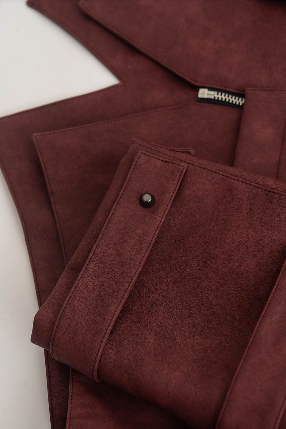 KADAKADA Swallowtail Rivet Zipper Faux Leather Jacket