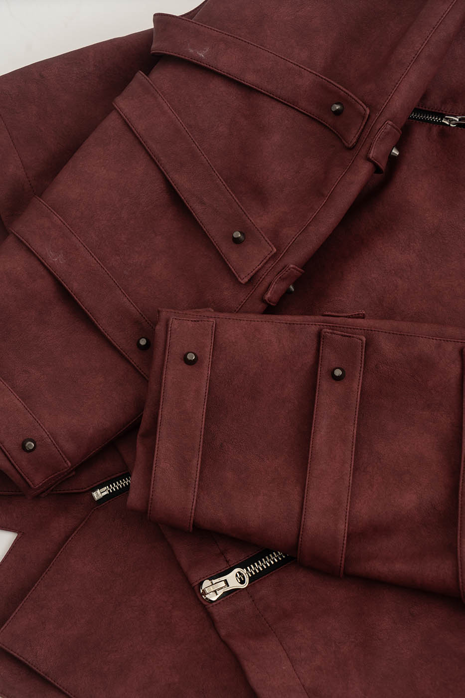KADAKADA Swallowtail Rivet Zipper Faux Leather Jacket