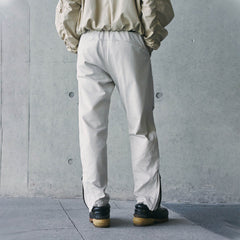 ENSHADOWER Spliced Crinkled Zippered Jogger Pants White