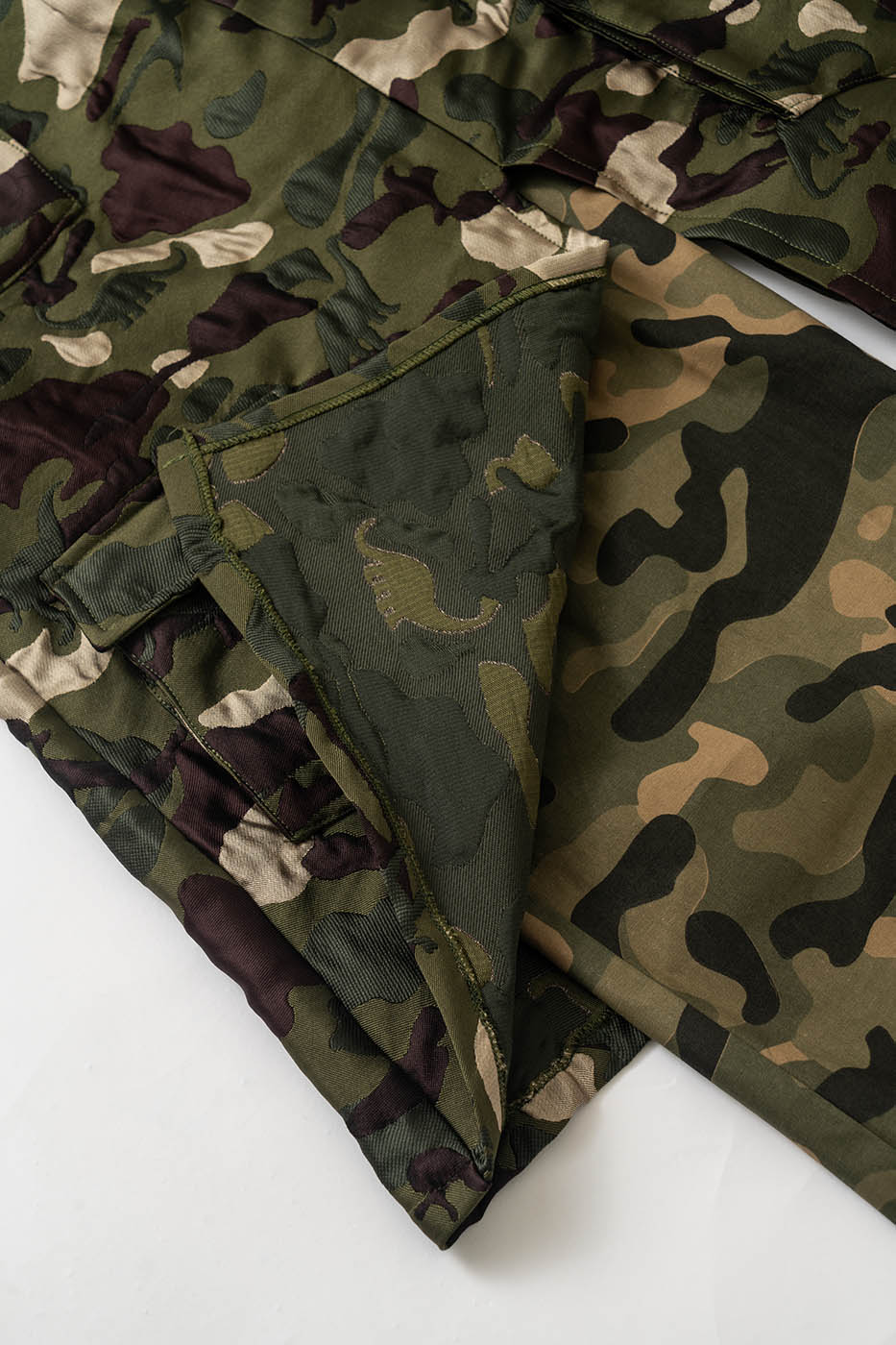 KADAKADA Dinosaur-Camo Embossed Multi-Pocket Skirt Pants