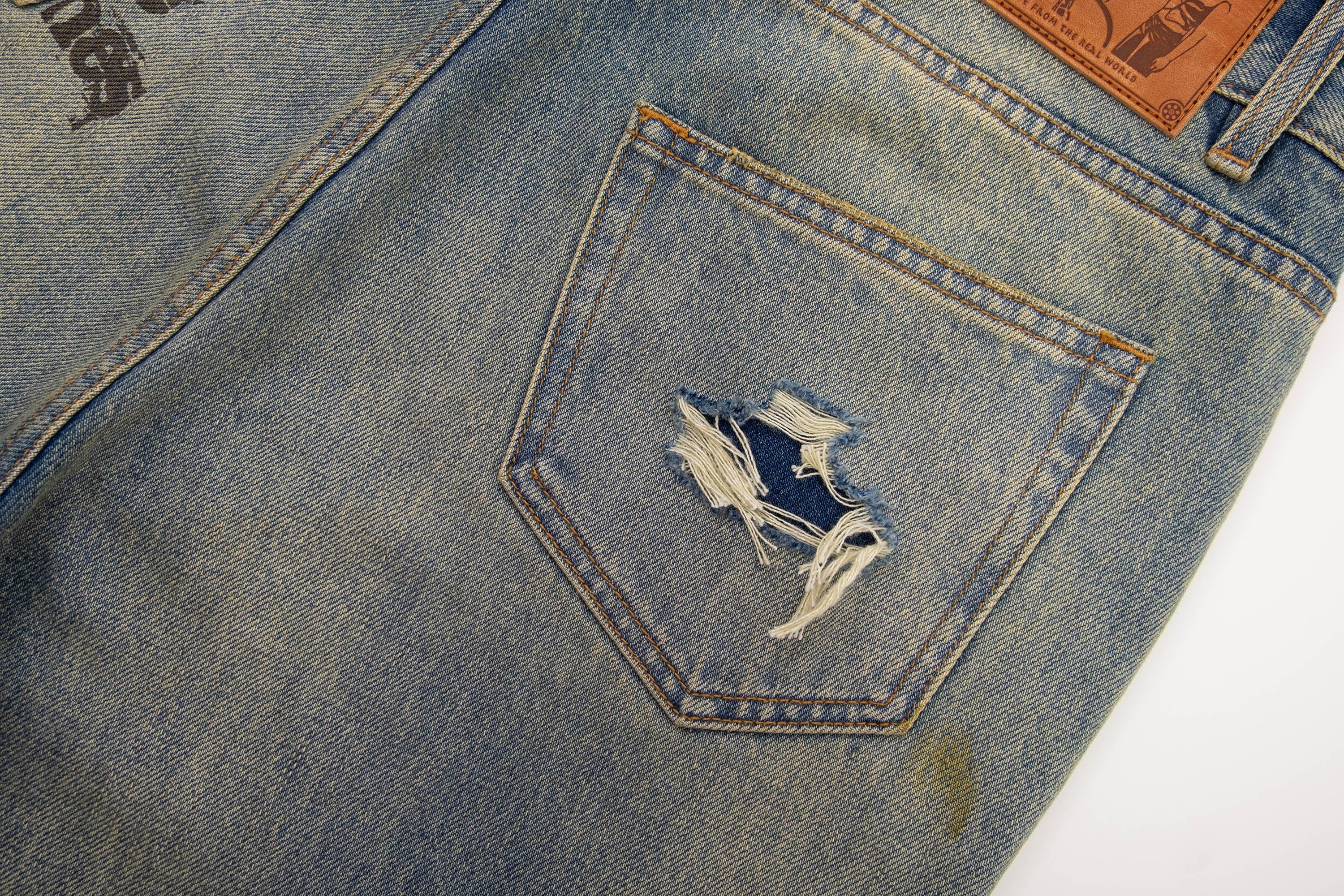 IN EXISTENCE Distressed Cut-Out Oversized Jeans