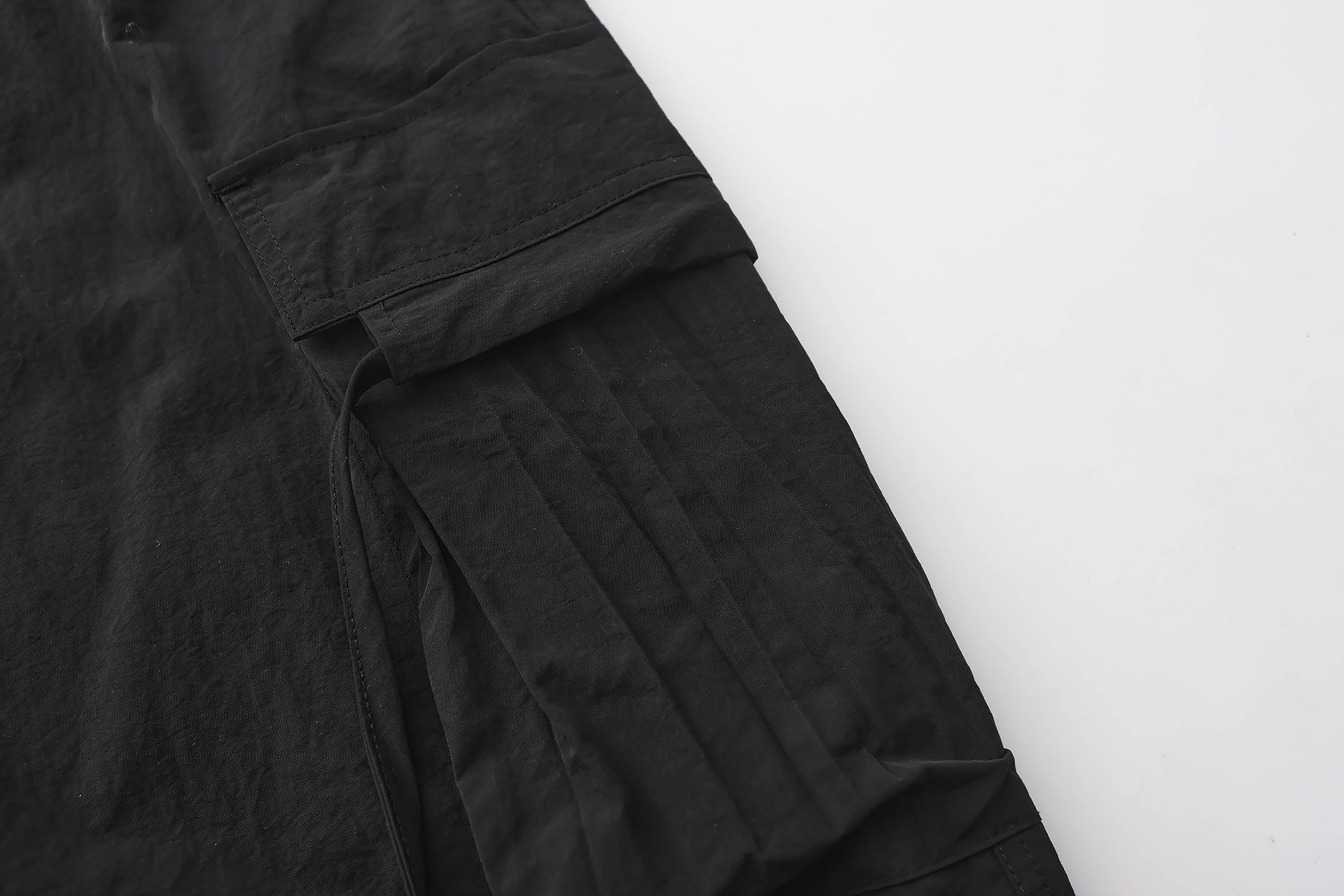 BLACK8MOB Eyelet Waist Tie Multi-Pocket Parachute Pants
