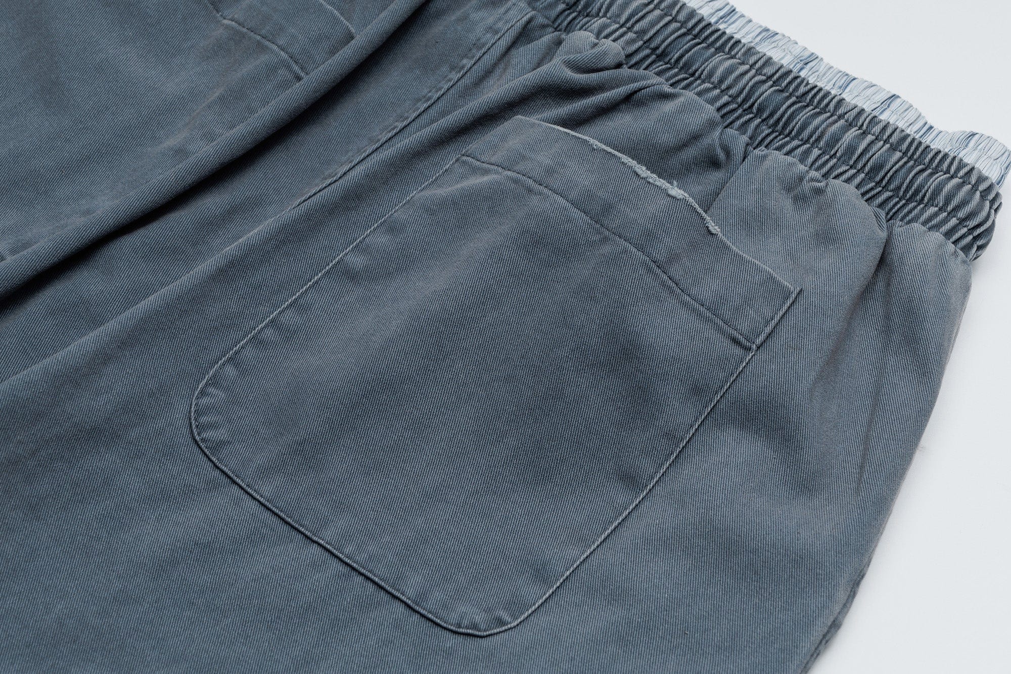 OVDY Layered-Waist Distressed Straight-Leg Pants
