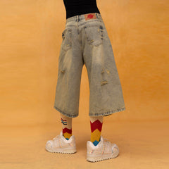 CLP Washed Ripped Knee-Length Denim Shorts