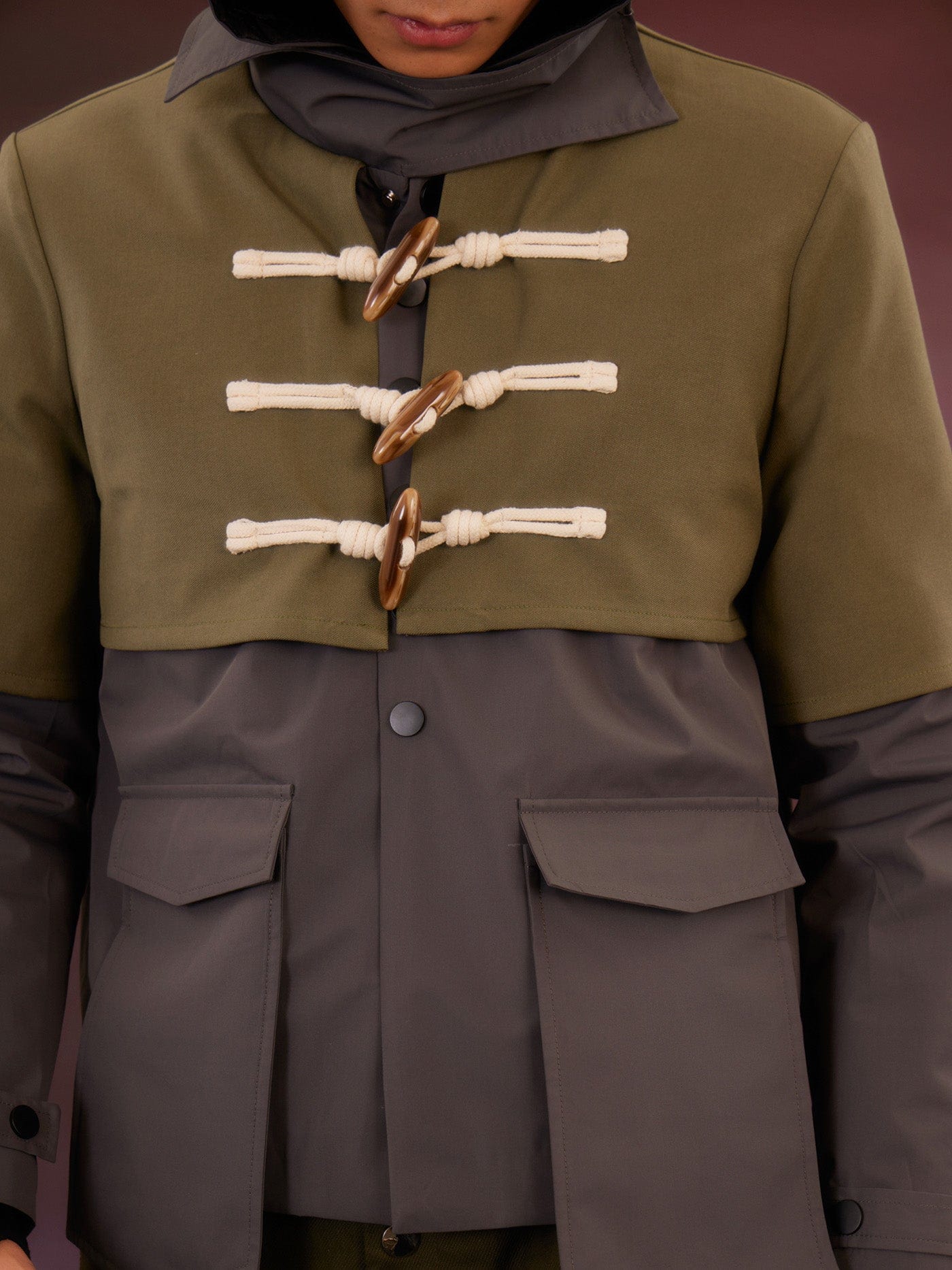 KADAKADA Layered Horn Button Large Pocket Hooded Jacket
