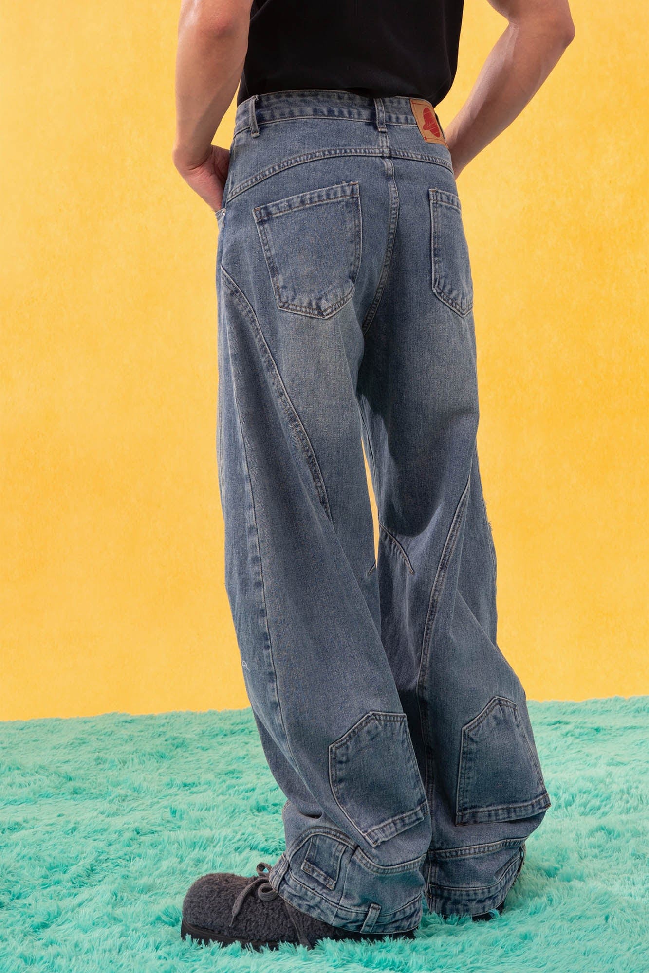 CLP Inverted-Waist Hem Paneled Distressed Jeans