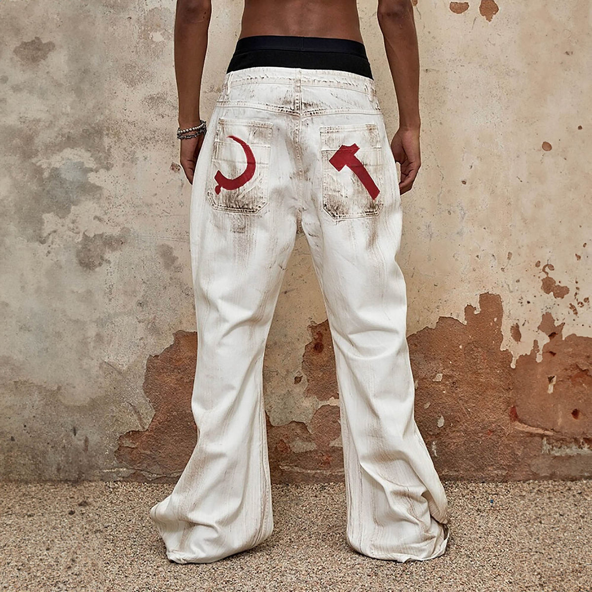 TRIANGLE PROJECT Distressed Crescent Blade Flared Denim Pants