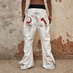 TRIANGLE PROJECT Distressed Crescent Blade Flared Denim Pants