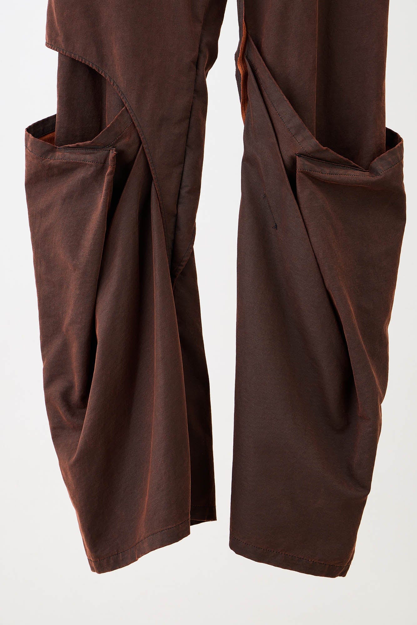 ILNya Nieternite Nifutur Weathered Coated Deconstructed Trousers