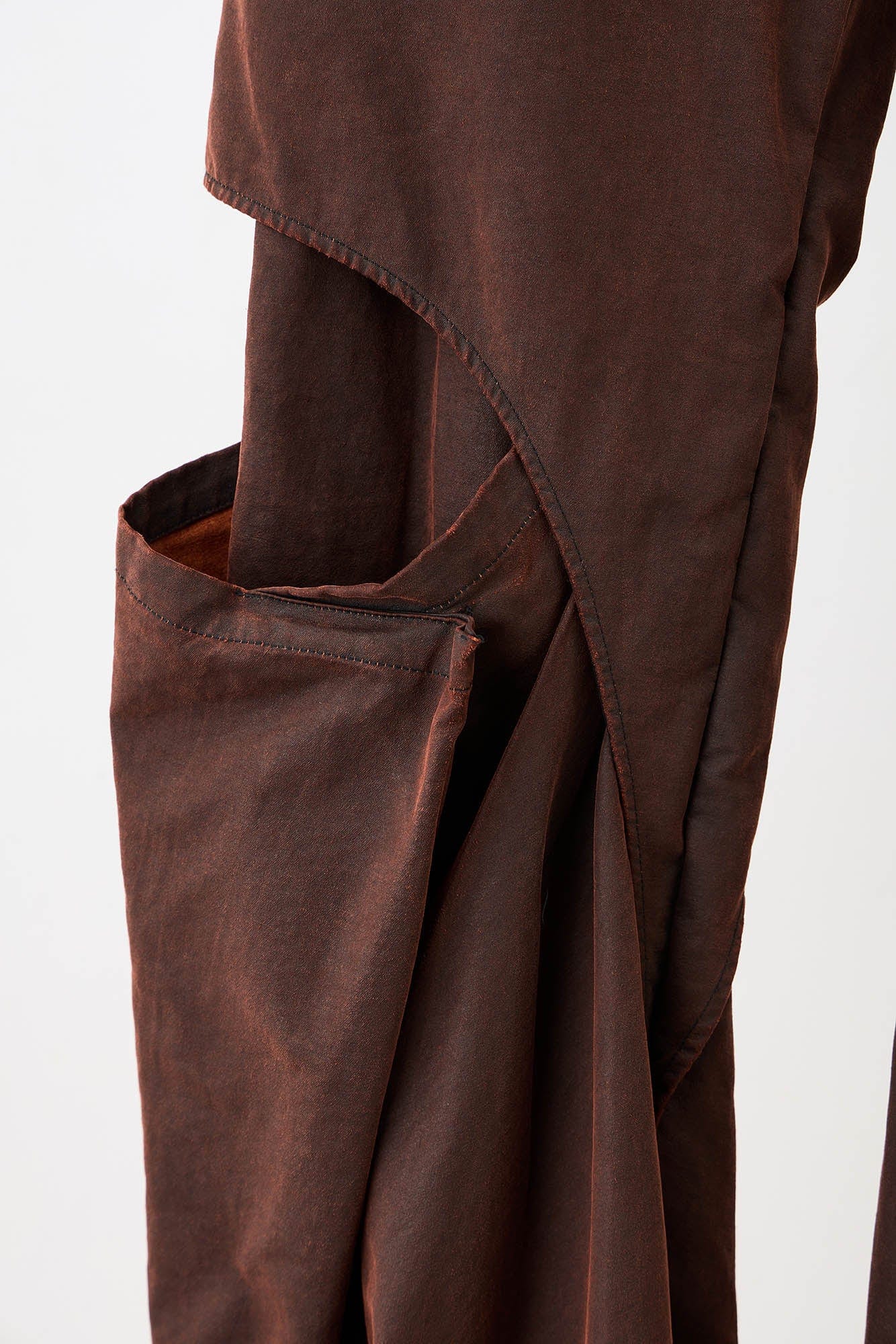 ILNya Nieternite Nifutur Weathered Coated Deconstructed Trousers