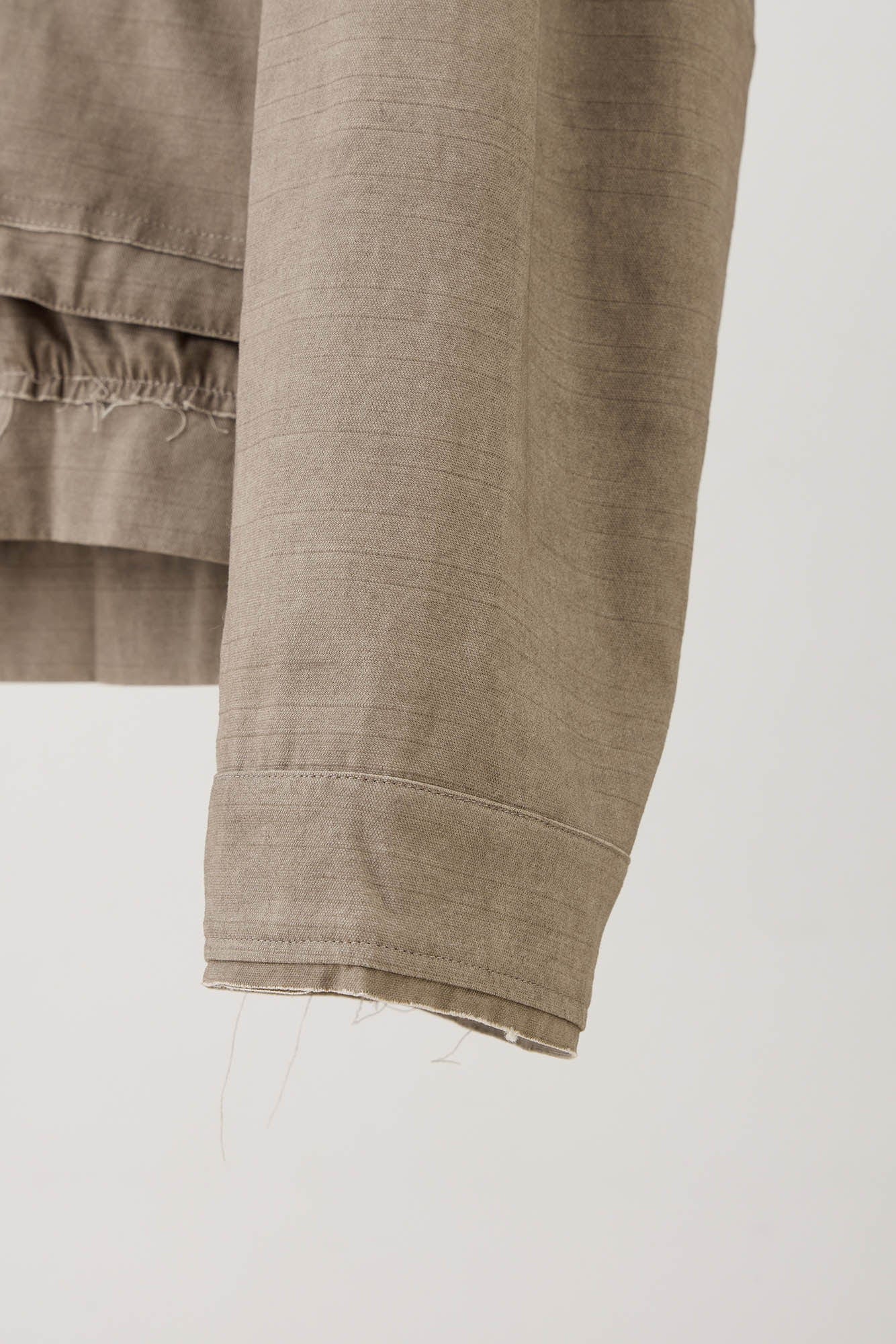 ILNya Nieternite Nifutur Arc Spliced Layered Raw-Edge Utility Jacket