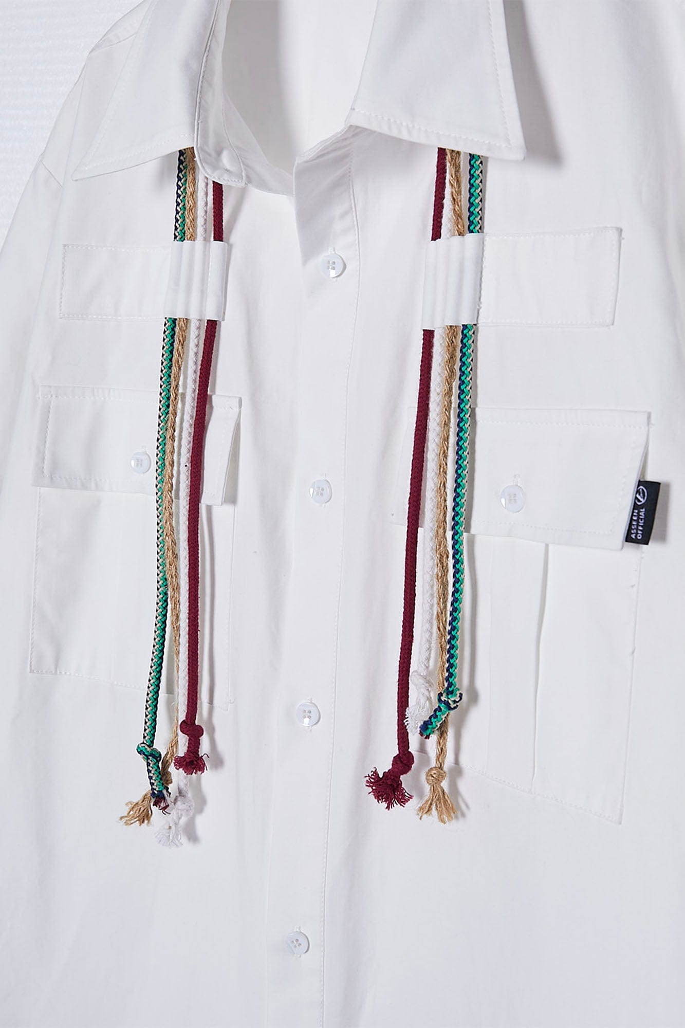 ASSEEN Cord Tassel Pocket Half Shirt